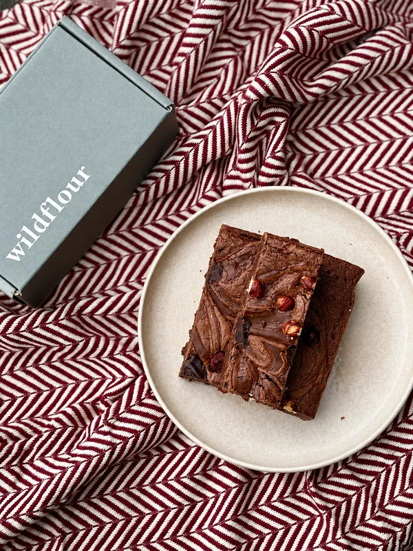 Chocolate brownies displayed outdoors