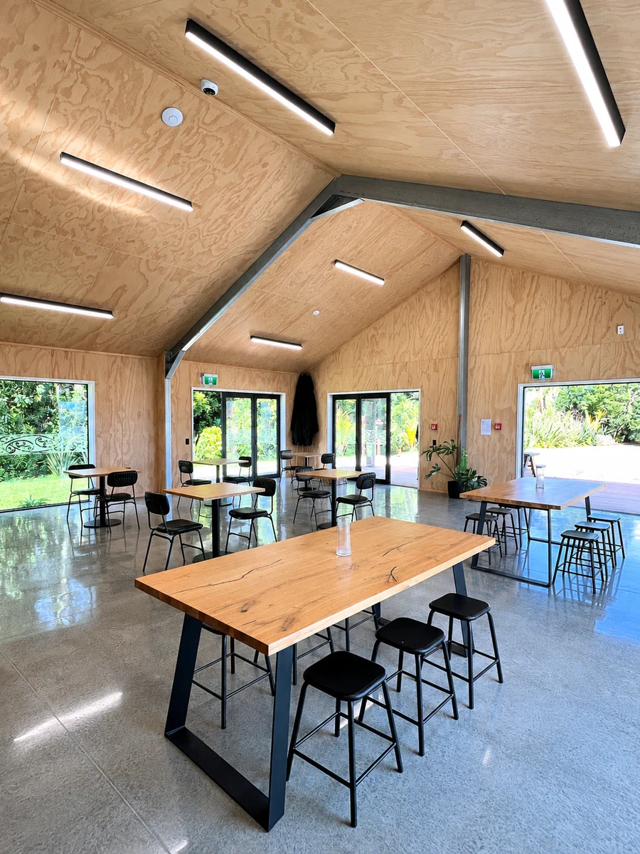 The light-filled timber dining room at Omanawa Cafe